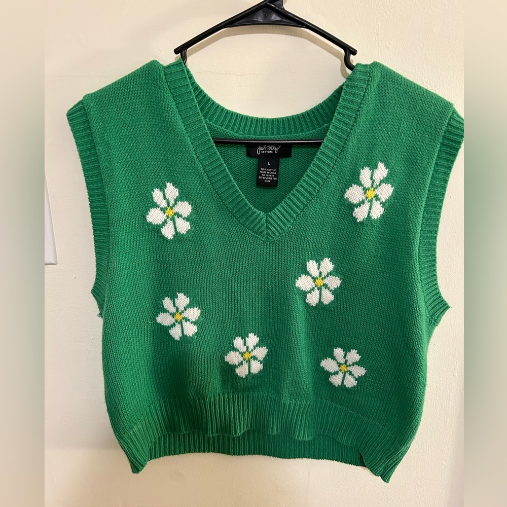 Green vest with flowers